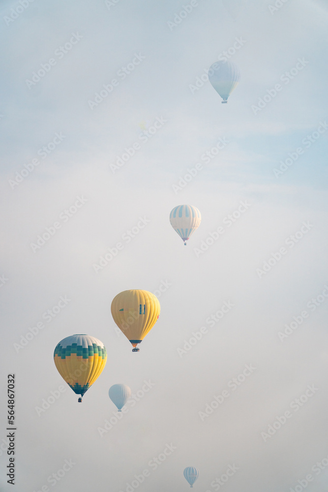 Hot air balloons in cloudy sky Hot air balloons in cloudy sky