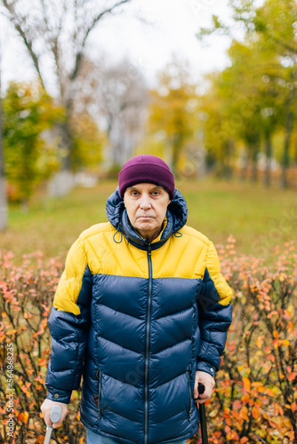 Disabled Senior man outdoors .