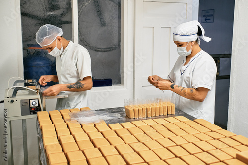 Employees packing food photo