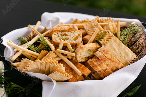 Basket of Bread, Crackers, and Crostini at the Wedding Reception photo
