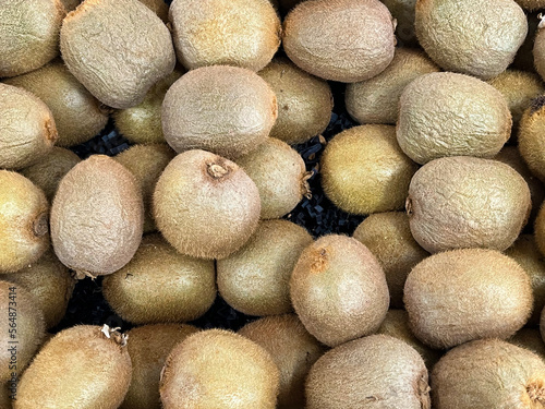 Fresh kiwi fruits at a market stand