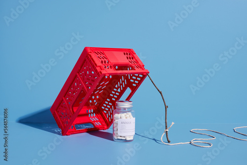 Box and stick trap with drugs photo