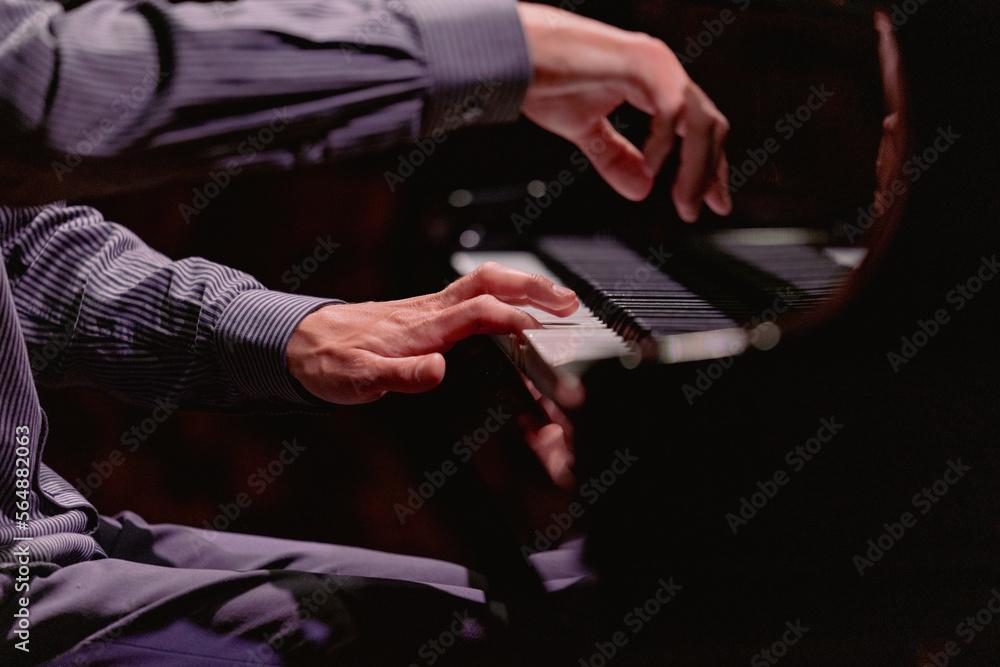 Hands close-up with a musical instrument Hands close-up with a musical instrument