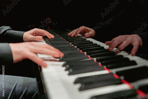 Hands close-up with a musical instrument