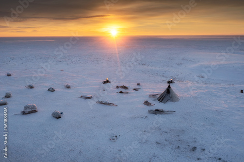 Reindeer herders camp at dawn photo