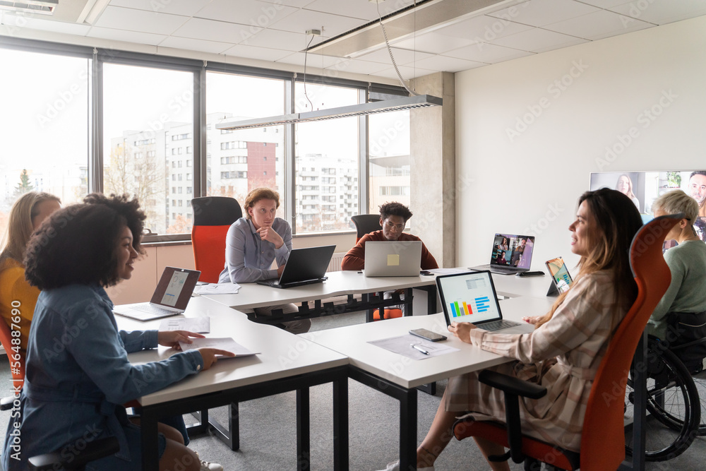 © Hernandez & Sorokina/Stocksy - Hybrid Meeting At Office