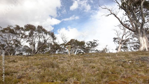 A bushman walking around his alpine camp in the Victorian high country. photo