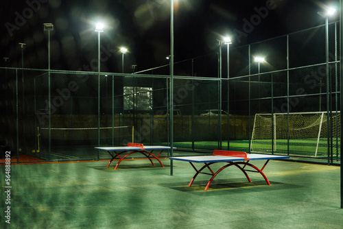 Table tennis tables at the outdoor sports playground photo