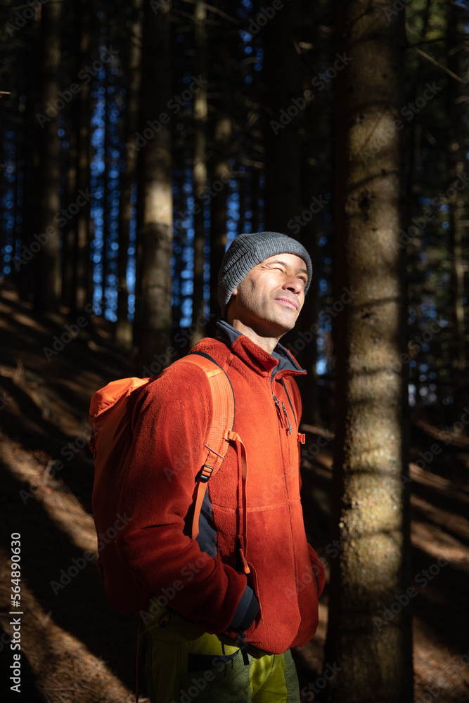 © Michela Ravasio/Stocksy - Portrait of hiker in the forest © Michela Ravasio/Stocksy - Portrait of hiker in the forest