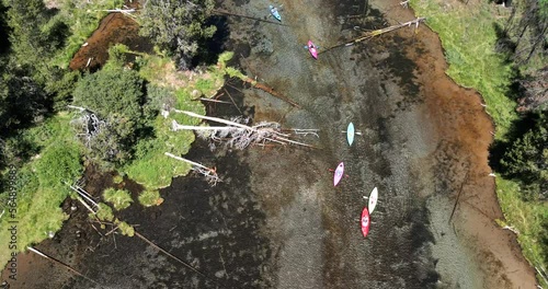 Kayaking the clear waters of Spring Creek in Southern Oregon photo