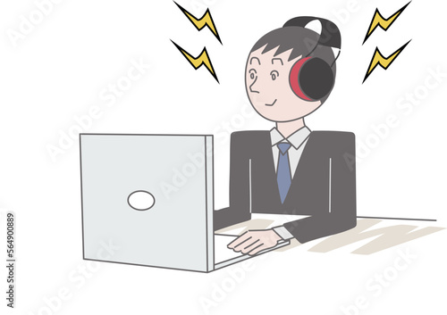 聴覚過敏で障害者の男性がイヤマフをつけてデスクワークをしているところ