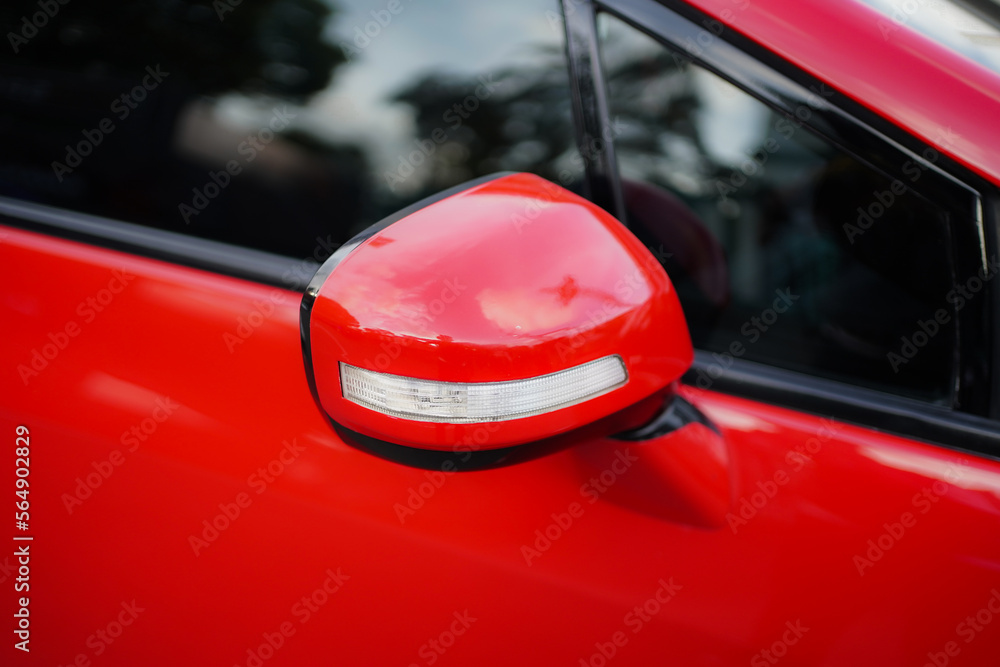close up of modern red car mirror