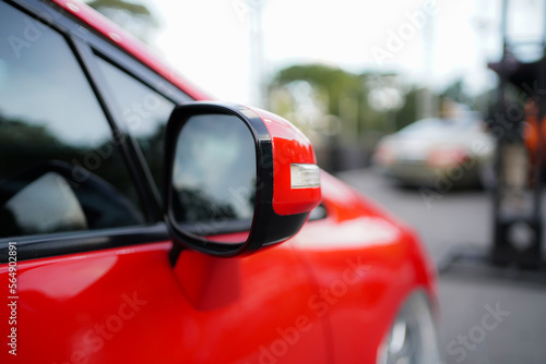 close up of modern red car mirror