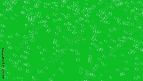 3d small bubbles constantly rise up on green screen. Abstract festive background for advertising, congratulations, text, Mother day, Valentine, Christmas, Birthday. 3D animation.