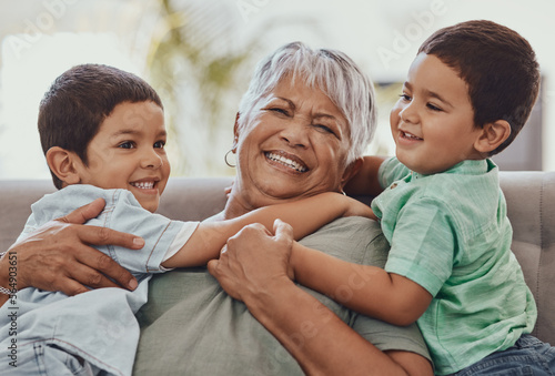 Fotografía Love, grandmother and boys on couch, smile and playful on weekend, bonding and loving together