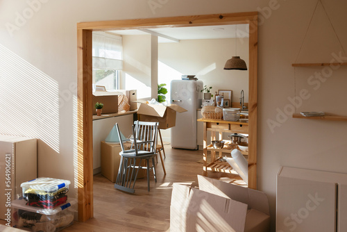 A room full of packing boxes at new apartment photo