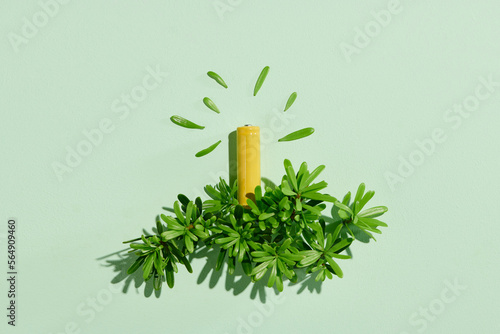 Eco energy or green power illustration with a yellow battery photo