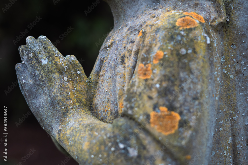 Hands of an angel statue in a graveyard Hands of an angel statue in a graveyard