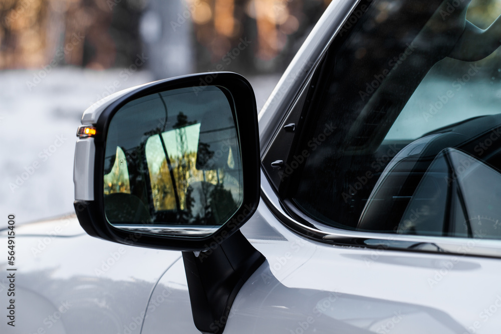 Car Rear-view mirror. Side view mirror of a car.