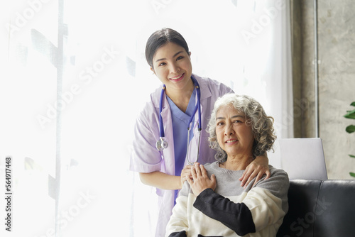  consulting female patient about pills and discussing health treatment sitting in the office at the desk. Medicine and health care concept. Doctor prescribing medicine to patient in the office.