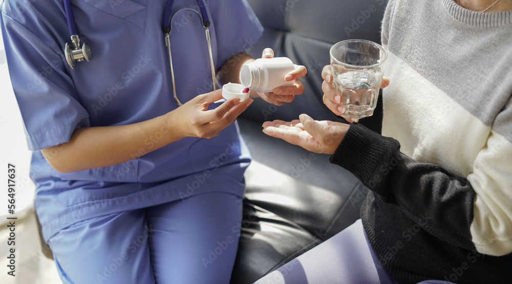 consulting female patient about pills and discussing health treatment sitting in the office at the desk. Medicine and health care concept. Doctor prescribing medicine to patient in the office. consulting female patient about pills and discussing health treatment sitting in the office at the desk. Medicine and health care concept. Doctor prescribing medicine to patient in the office.