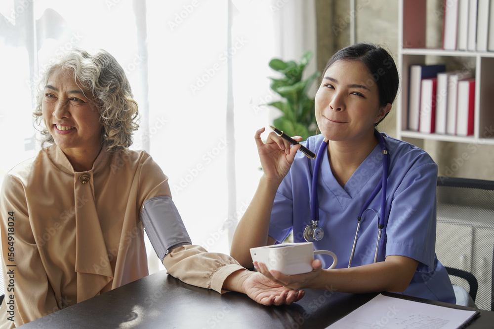 consulting female patient about pills and discussing health treatment sitting in the office at the desk. Medicine and health care concept. Doctor prescribing medicine to patient in the office. consulting female patient about pills and discussing health treatment sitting in the office at the desk. Medicine and health care concept. Doctor prescribing medicine to patient in the office.
