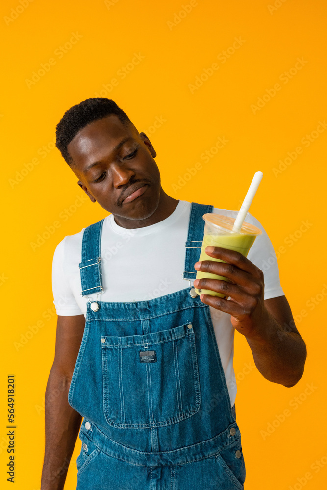 Black man enjoying takeaway drink Black man enjoying takeaway drink