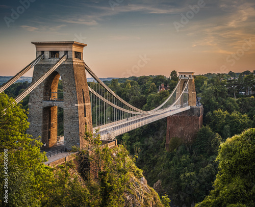 View of beautiful suspension bridge over a gorge at sunset