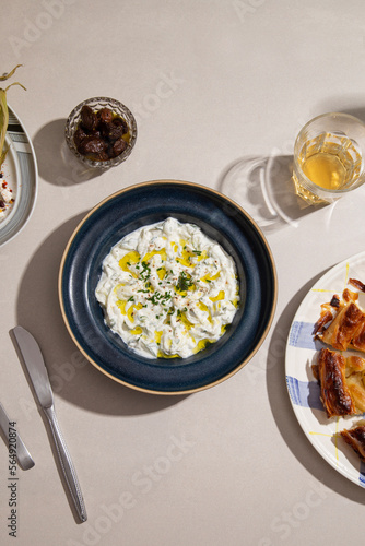 Tzatziki salad on the table photo