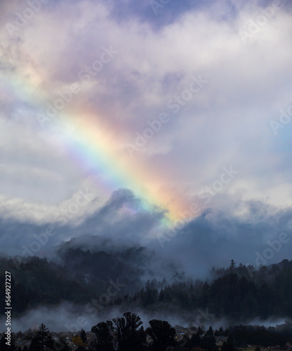 Dark clouds and ranbows photo