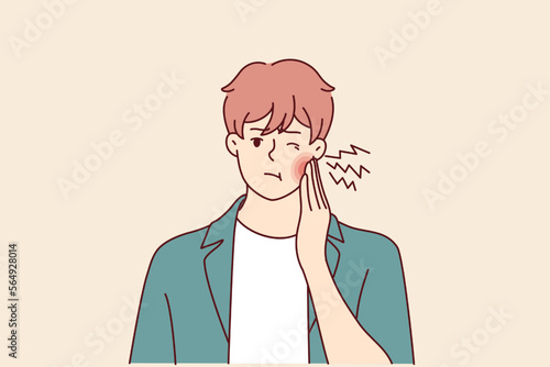 Man has pain in teeth and puts hand on red cheek due to caries or inflammation of nerves in gums. Suffering guy needs to go to dentist or orthodontist for filling or prosthesis. Flat vector design 