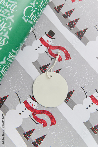 Round blank label on Christmas paper photo