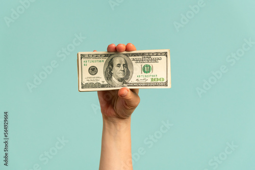 Hand holding money photo