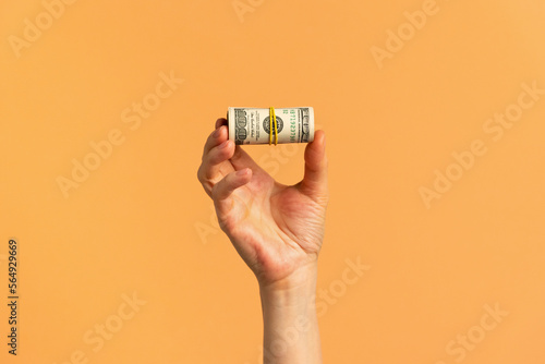Hand holding money