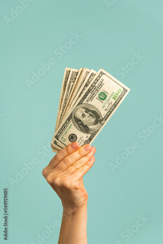 Hand holding money
