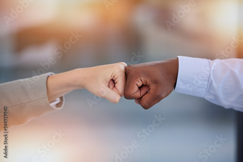 Hands fist bump, support and diversity for business people with goals, motivation and inspiration by blurred background. Closeup, hand touch and solidarity with team building, trust and partnership