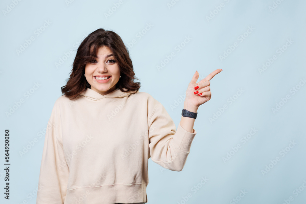 Gen Z Blogger Pointing to Copy Space in Studio Gen Z Blogger Pointing to Copy Space in Studio
