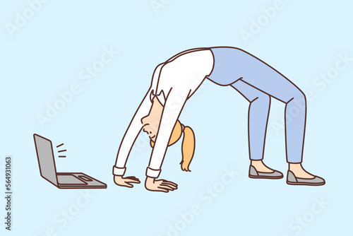 Businesswoman do gymnastics watching online fitness class