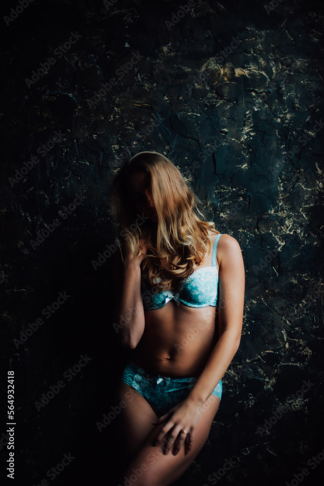 tanned girl in blue lingerie. beautiful figure tanned girl in blue lingerie. beautiful figure