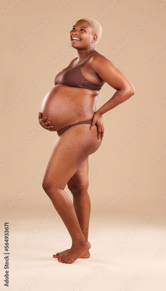 Stockfoto med beskrivningen Black woman laughing or holding