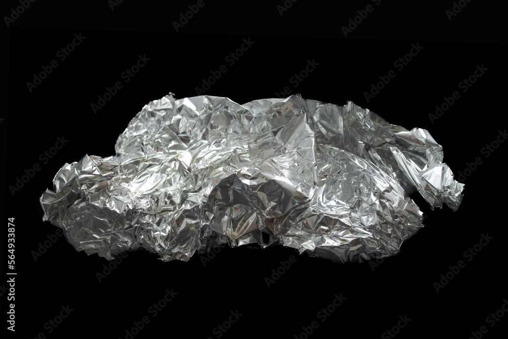 Crumpled foil on a black background.