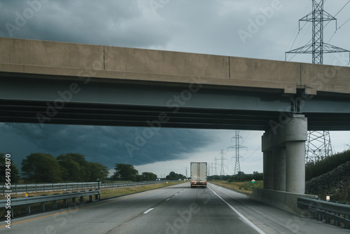 Truck driving on highway in storm