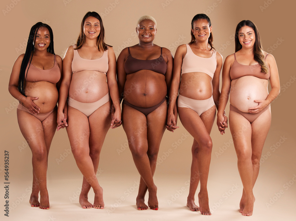 Pregnant, women or diversity portrait with stomach on studio background in body love, baby or community support. Smile, happy or pregnancy friends in underwear for tummy growth or mothers empowerment