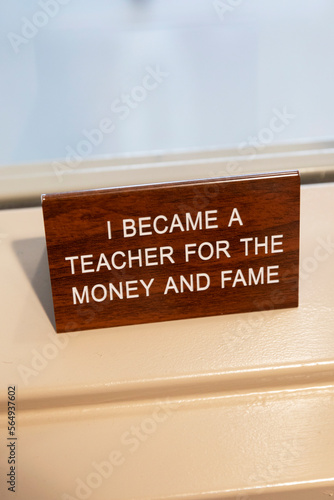 Sign in School about Teacher sarcasm Money and Fame  photo