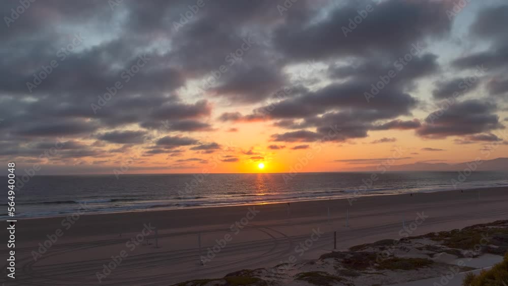Cloudscape On Sunset Sky Over Tropical Ocean In Manhattan Beach, California USA. Timelapse Cloudscape On Sunset Sky Over Tropical Ocean In Manhattan Beach, California USA. Timelapse