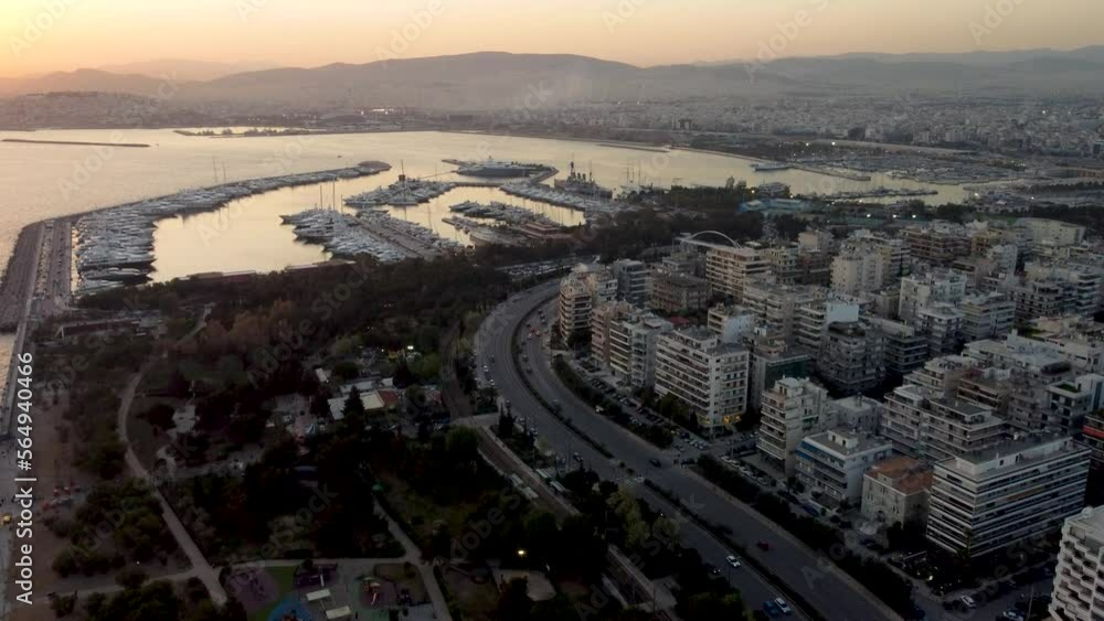 Aerial View of Flisvos Marina, Palaio Faliro, Athens, Greece After Sunset. Coastal Traffic and Buildings Aerial View of Flisvos Marina, Palaio Faliro, Athens, Greece After Sunset. Coastal Traffic and Buildings