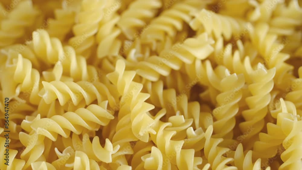 Golden dry pasta extremely close-up in macro mode. Rotation 4K Golden dry pasta extremely close-up in macro mode. Rotation 4K