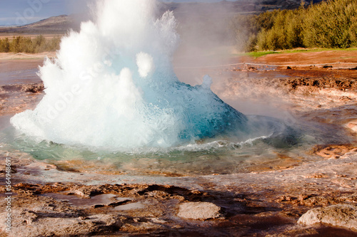 Erupting geyser,â€ Geysir, Iceland photo