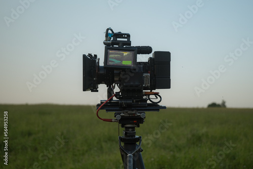 Cinema Movie Camera On Steady Cam Gear Outdoors Filming photo