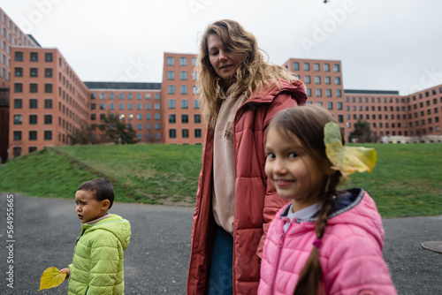 Confused little boy and his relatives  photo